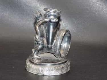 Ornate antique figural napkin ring.