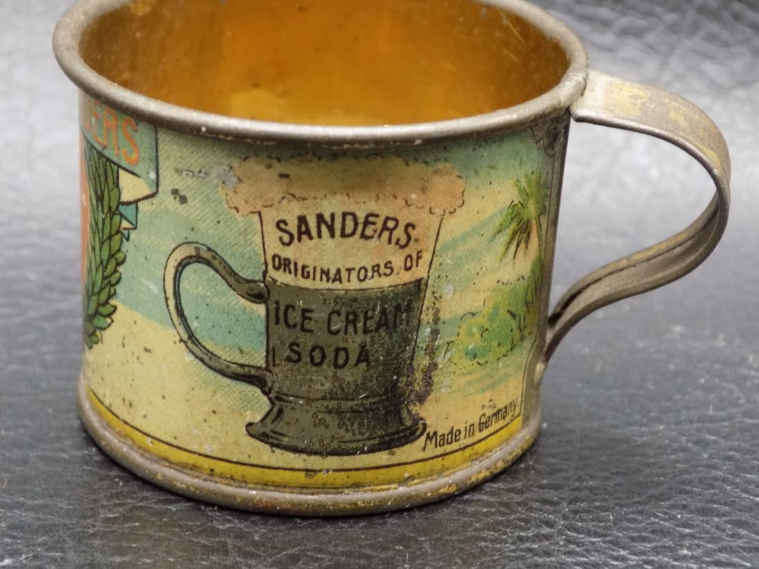 Antique advertising Palace of Sweets Detroit tin cup: Antique advertising Palace of Sweets Detroit tin cup. Made in Germany. Beautiful colors. In very good original as found condition with minor wear as shown in photos., normal from use and age. Great qu