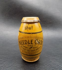 Unusual antique advertising  wood sewing needle case.