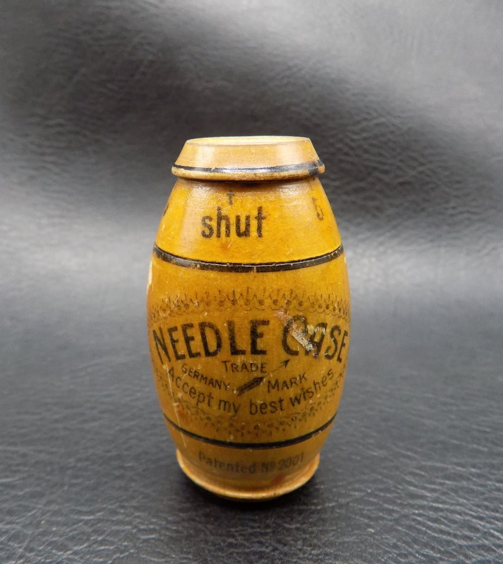 Unusual antique advertising  wood sewing needle case. (1 of 12)