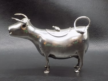 Great antique sterling silver cow creamer with bumblebee on back
