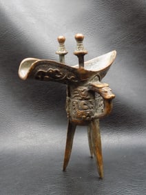 Vintage ornate Chinese bronze wine drinking vessel or cup