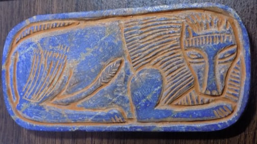 Ancient middle east lapis lazuli tile tablet depicting lion