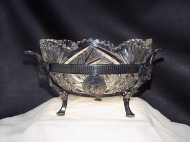 Fabulous antique cut glass bowl in Rogers  Smith  decorated silverplate frame
