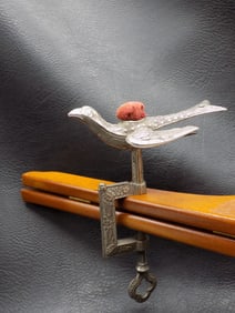 Highly decorated antique sewing bird.