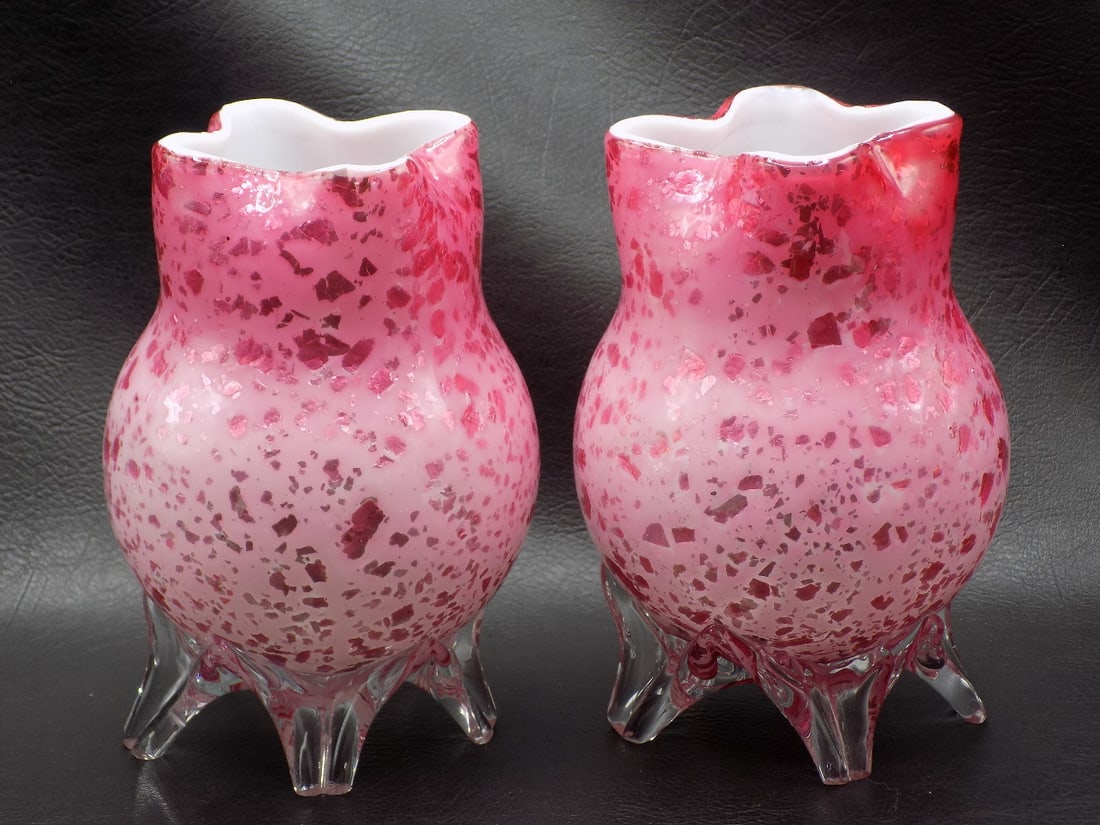 Antique pair of silver mica pink cased art glass vases: Antique pair of silver mica pink cased art glass vases. Clear applied feet. Beautiful colors. In very good original as found condition. Great quality and detail. White lines are camera flash reflectio