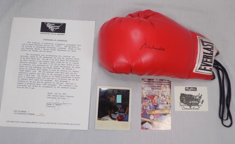 Incredible signed Mohammed Ali autographed boxing glove with DNA & COA.