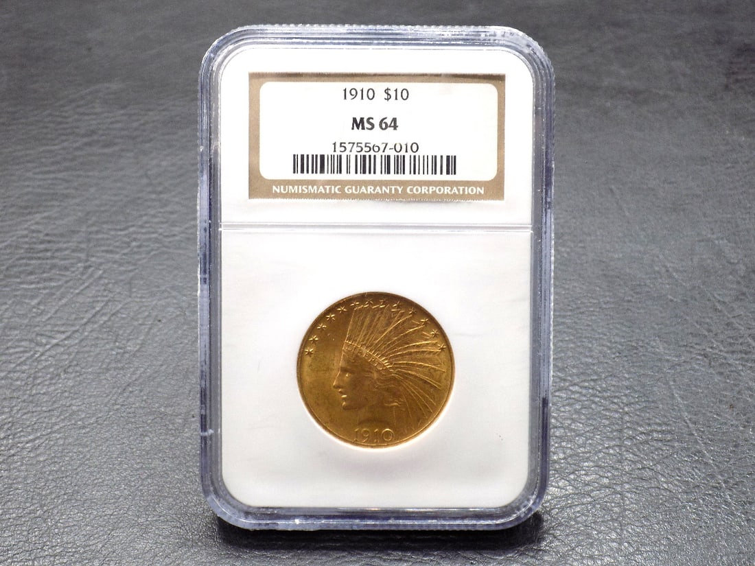 1910 $10 dollar graded MS64 gold coin by NGC: 1910 $10 dollar graded MS64 gold coin by NGC. Please see photos. No credit cards for gold coins. Payment through Live Auctioneers or cashier’s check. No shipping out of United States. For in house s