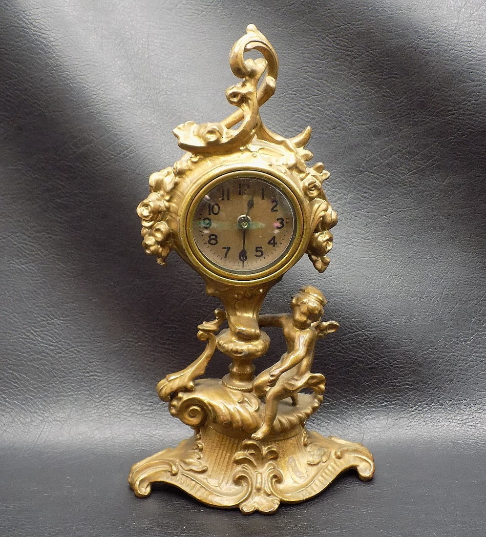 Art Nouveau figural clock with cupid (1 of 9)