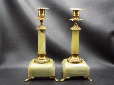 Antique pair of brass and onyx candlesticks.