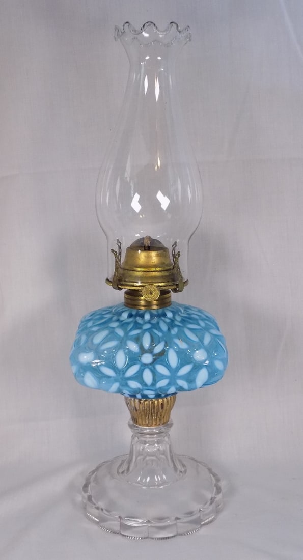 Antique blue opalescent snowflake art glass kerosene lamp.: Antique blue opalescent snowflake art glass kerosene lamp. Beautiful colors. In very good original as found condition. Great quality and detail. 17 ¾ tall to top of chimney. Base 10 ¼ in