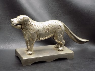Antique nickel plated cast iron dog nut cracker