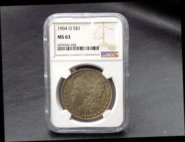 1904 O  graded MS63 silver dollar coin by NGC