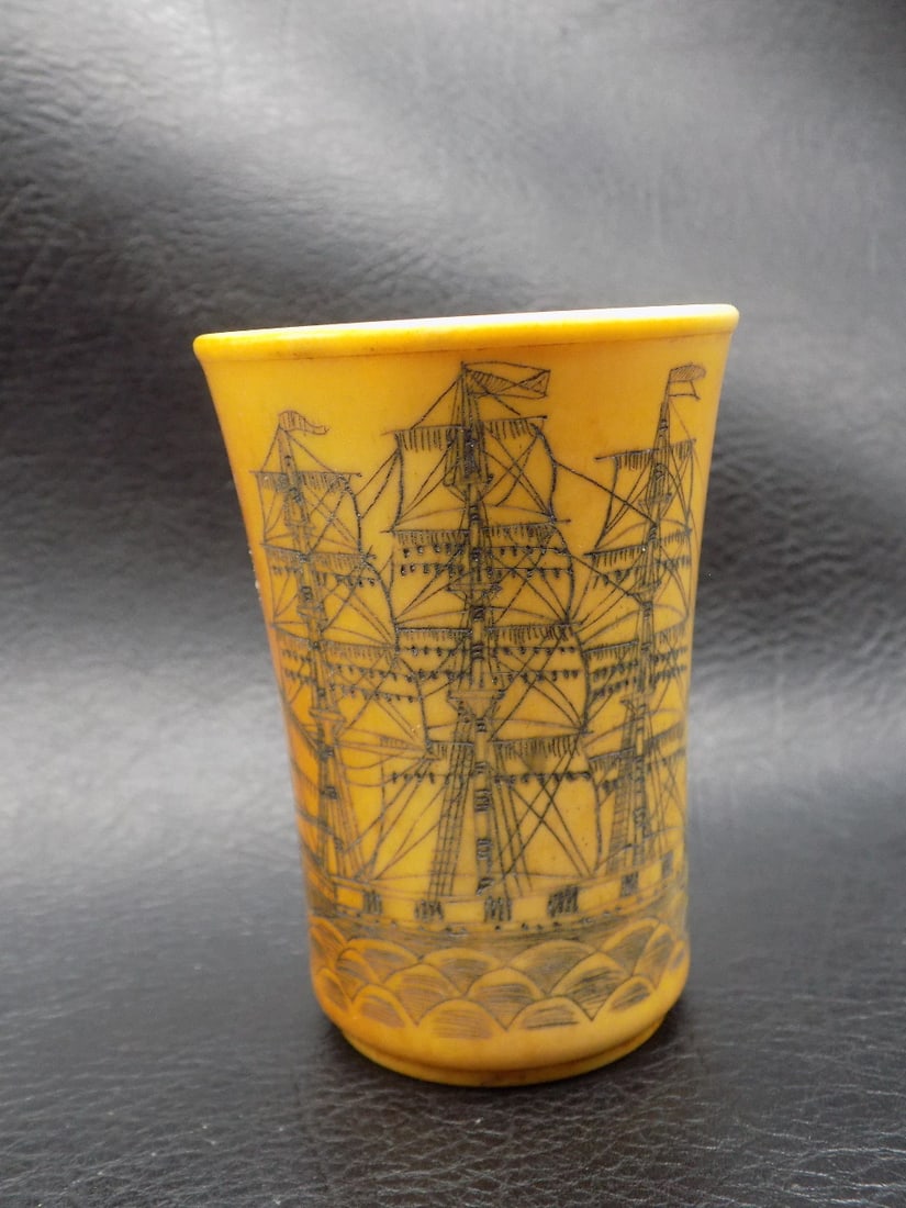 Scrimshaw horn shot cup with Ship Susan.: Scrimshaw horn shot cup with Ship Susan. In very good original as found condition. Great quality and detail. 2 ½ inches tall x 1 ¾ wide at top rim. For in house shipping please call Mike