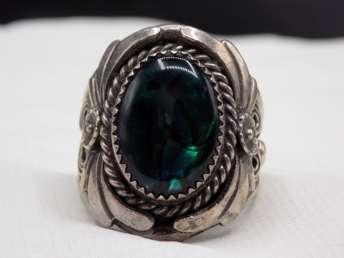 Vintage Native American Indian sterling silver ring: Vintage Native American Indian sterling silver ring. Appears to be green abalone. Signed S C as shown in photo. Attributed to Sharon Cisco. Size 11 ½. White lines are camera flash reflection. B