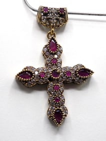 6 cwt ruby and topaz sterling silver cross.