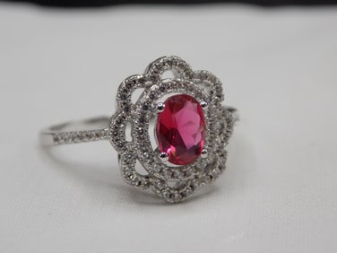 2 cwt ruby and topaz sterling silver ring.