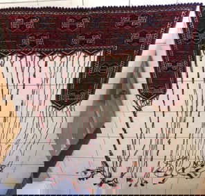 Vintage Oriental rug tent door entry.