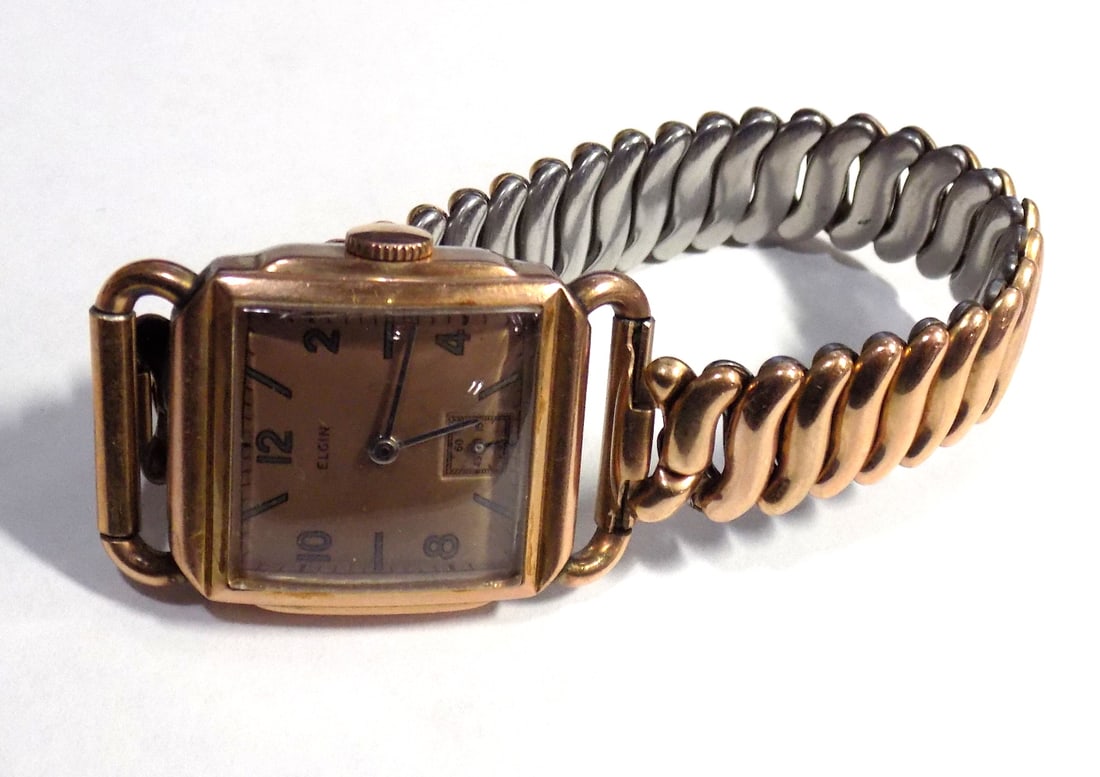Vintage Elgin 15 jewel 10k gold fill wrist watch: Vintage Elgin 15 jewel 10k gold fill wrist watch. Marked on back of case as shown in photo. Running part time at time of listing. Great quality and detail. Dial size ¾ square. For in house ship