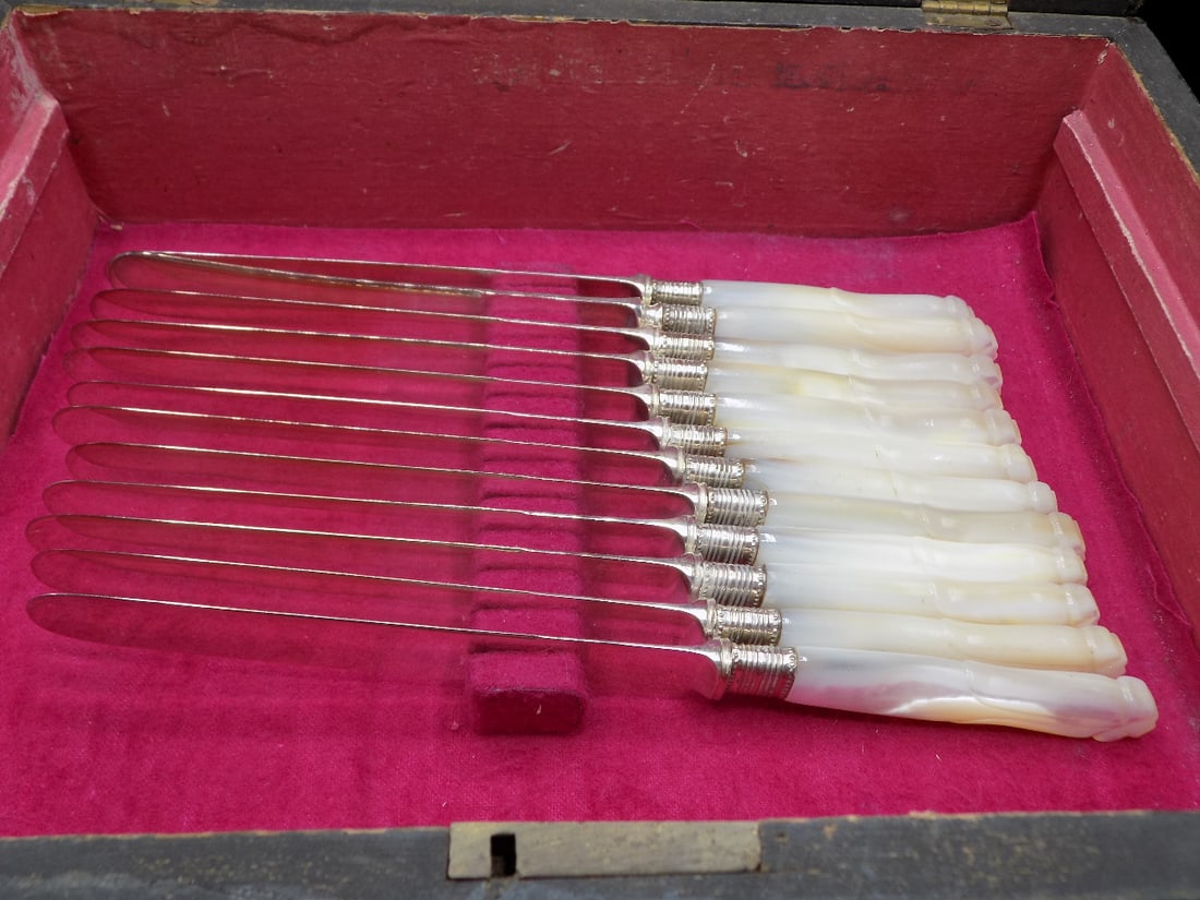 Set of antique mother of pearl knives by Meriden Cutlery Co: Set of antique mother of pearl knives by Meriden Cutlery Co. Box was made in 1978 by Great Grandfather on note as shown in photo. Knives are marked as shown in photo. Knives 9 1/8 long. Box is 12 x 9 