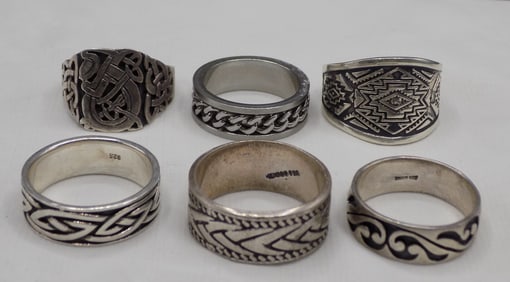 Six vintage sterling silver and artist marked rings