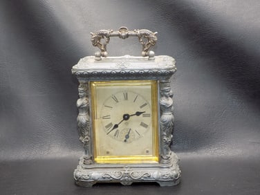 Ansonia comet carriage clock with figures