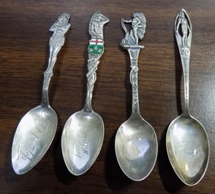 Four vintage sterling silver spoons with Native American Indians