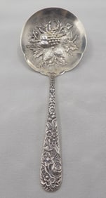 Antique S Kirk and Son Repousse sterling silver berry serving spoon.