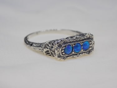 Beautiful blue fire opal sterling silver ring