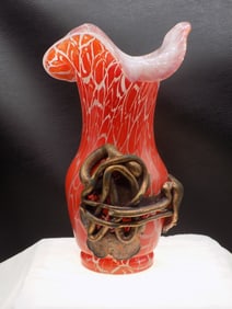 Unusual vintage Murano style art glass vase with heavily applied bronze or metal mounting.