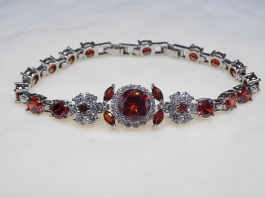 Beautiful 26 cwt ruby and topaz sterling silver bracelet