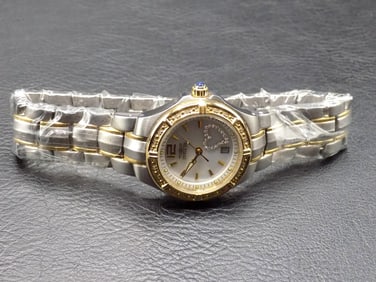 Vintage Invicta #6391 14k gold wristwatch with diamond bezel and heart