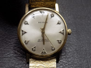 Rare 39 jewel gold Benrus wristwatch with diamonds
