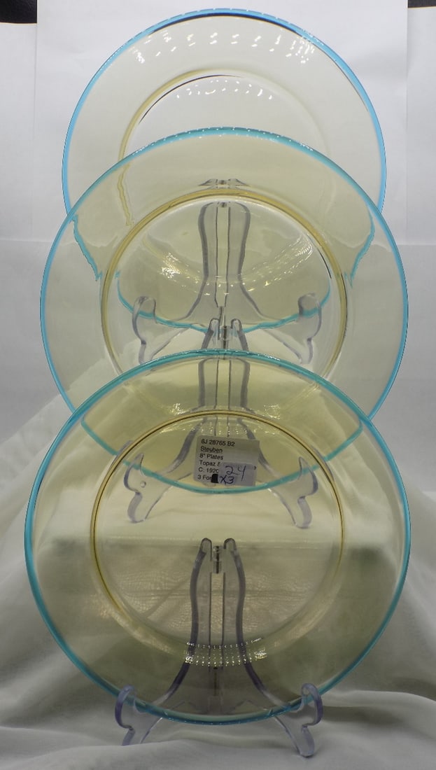 Three vintage Steuben art glass topaz with celeste blue trim plates: Three vintage Steuben art glass topaz with celeste blue trim plates. Beautiful colors. In very good original as found condition. Great quality and detail. White lines are camera flash reflection. 1920