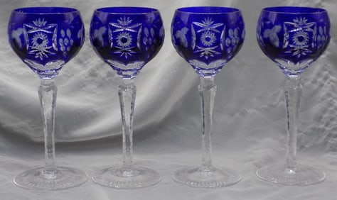 Set of four cut glass cobalt blue to clear wine glasses