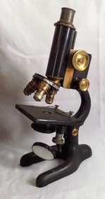 Antique Bausch and Lomb microscope with original wood case