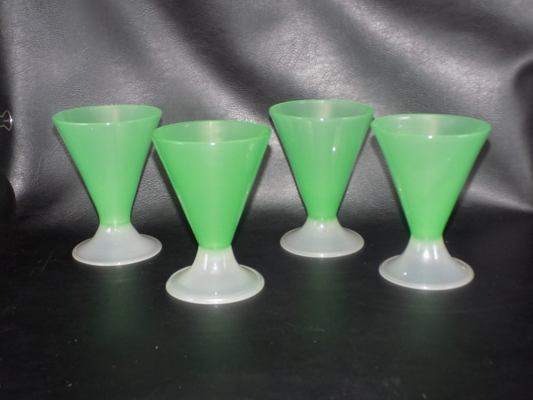 Vintage set of four Steuben jade green and alabaster footed art glass wine glasses: Vintage set of four Steuben jade green and alabaster footed art glass wine or martini glasses. 1920s. Beautiful colors. In very good original as found condition. Great quality and detail. White lines