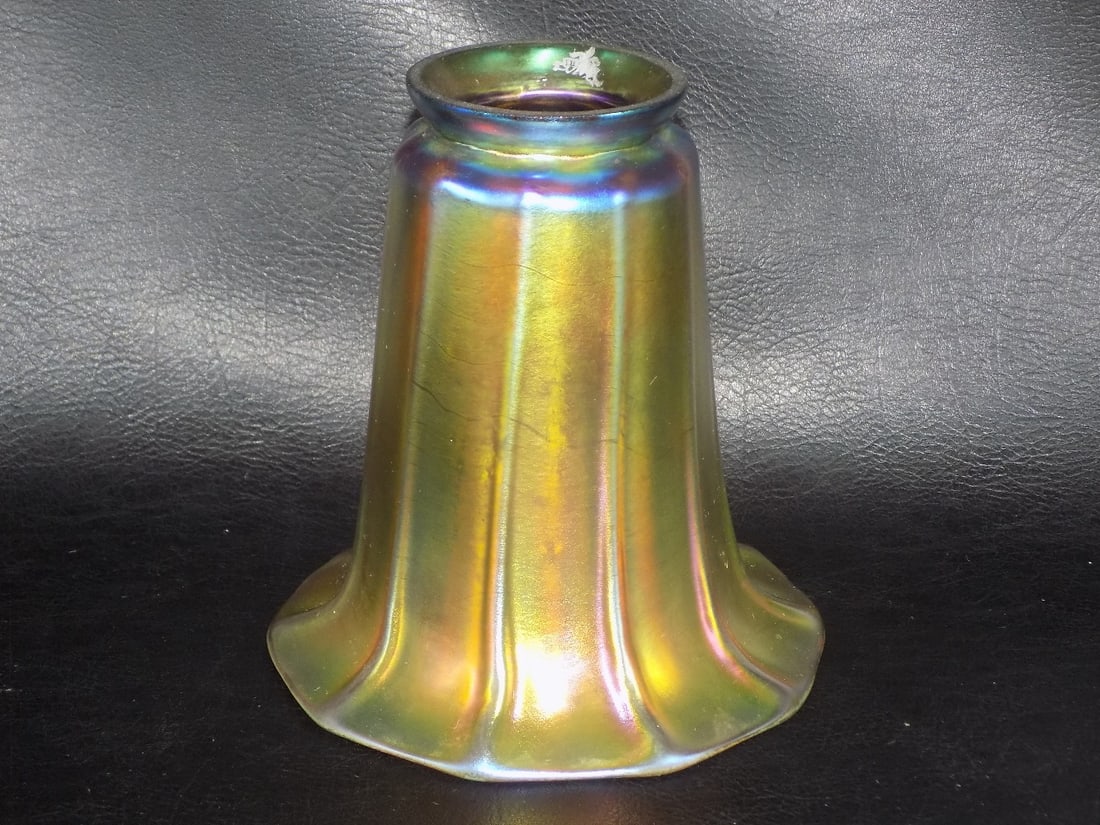 Vintage Steuben gold aurene art glass shade: Vintage Steuben gold aurene art glass shade. Marked on top rim as shown in photo. Beautiful colors. In very good original as found condition. Great quality and detail. 5 inches tall. Fitter rim 2 &fra