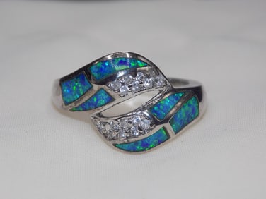 Beautiful Australian and topaz sterling silver ring.