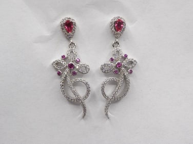 Beautiful pair of ruby and topaz sterling silver earrings