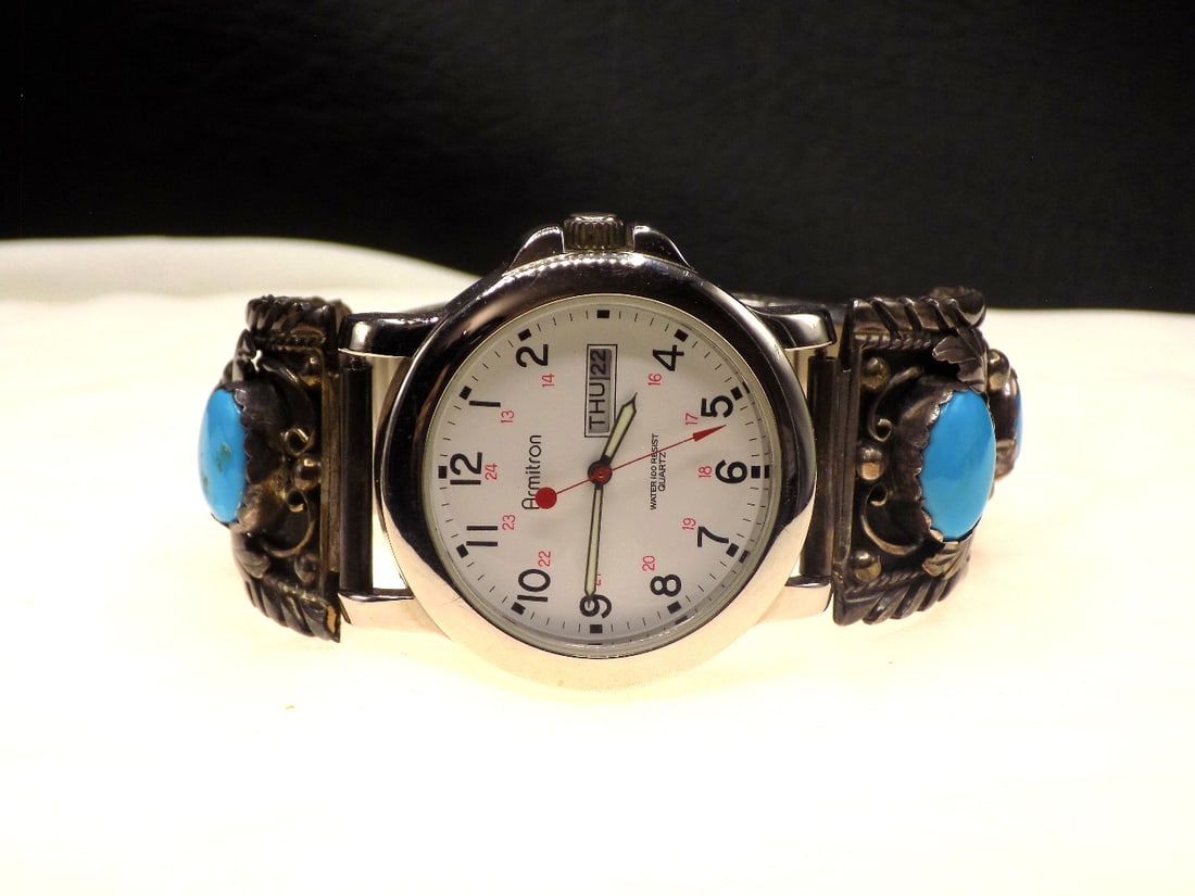 Vintage Native American Indian artist signed sterling silver watch band with turquoise: Vintage Native American Indian artist signed sterling silver watch band with turquoise. Marked as shown in photo. 30mm. In very good original as found condition. Great quality and detail. For in house