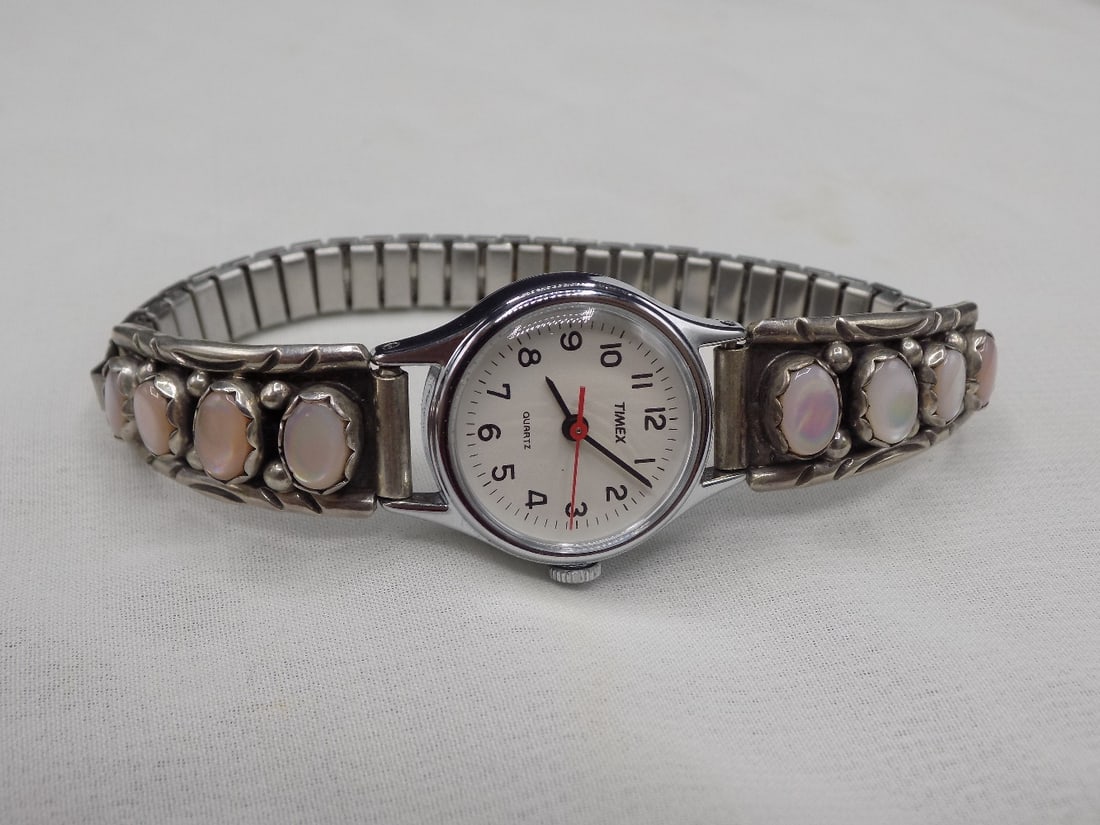 Vintage Native American Indian watch with sterling inlaid band with mother of pearl: Vintage Native American Indian watch with sterling inlaid band with mother of pearl. Beautiful colors. In very good original as found condition. Great quality and detail. Wound tight and not running a
