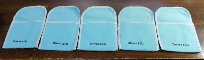 Five vintage Tiffany cloth jewelry bags