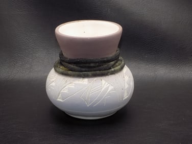 Native American Indian decorated pottery vase with leather coil