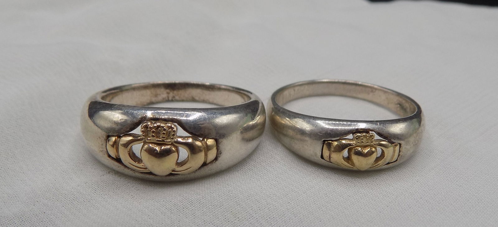 2 sterling rings with gold heart. Marked as shown: 2 sterling rings with gold heart. Marked as shown size 12. . In very good original as found condition. Great quality and detail. For in house shipping. Please call Mike at Thriftiques 319-321-0613