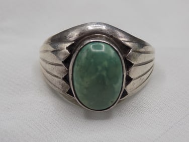 2 sterling rings with malachite. marked as shown