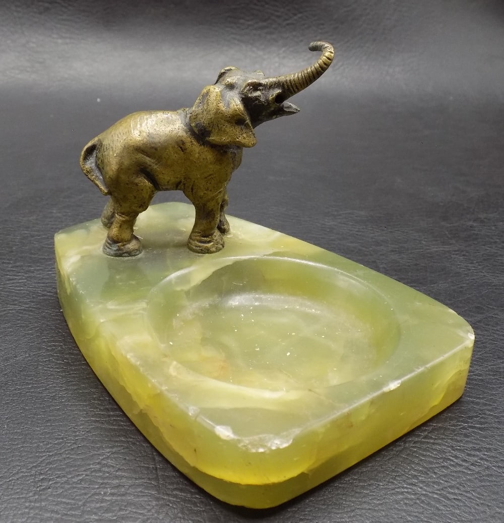 Art Deco bronze elephant on onyx base ring tray: Art Deco bronze elephant on onyx base ring tray. In very good original as found condition. Great quality and detail. 3 ¼ inches tall x 4 ½ x 3 ¼ inches. For in house shipping, ple
