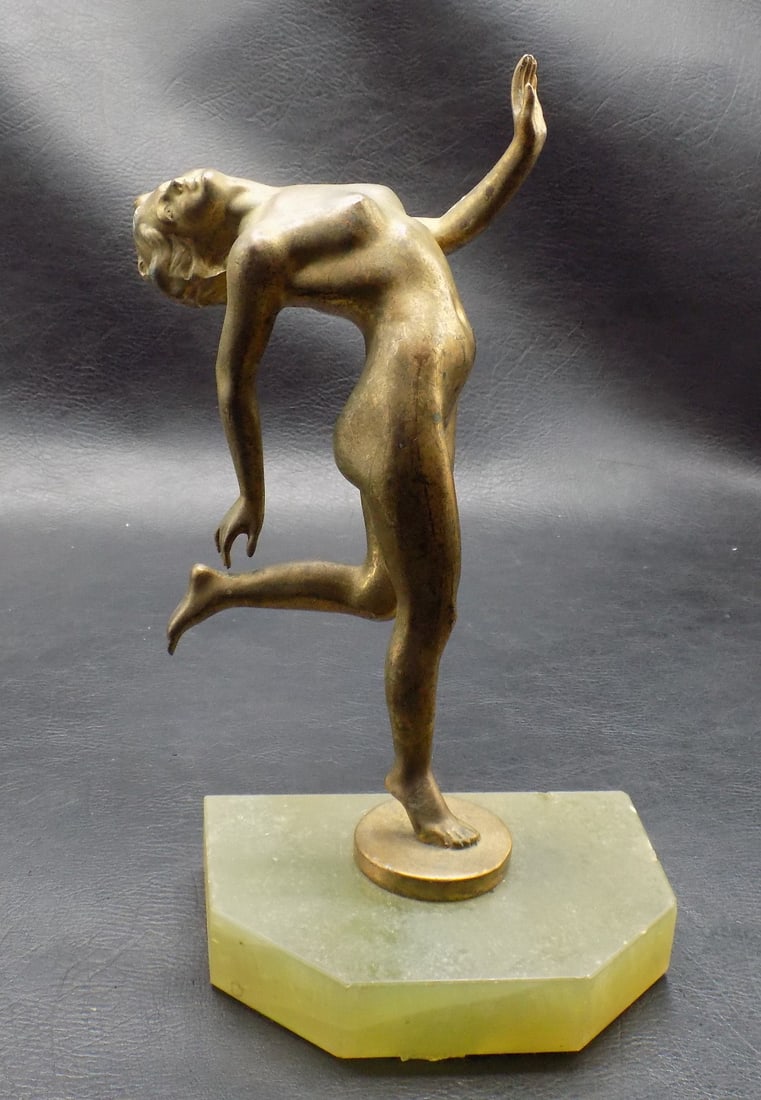 Art Deco bronze of nude female dancer on onyx base: Art Deco bronze of nude female dancer on onyx base. Attributed to French sculpture Lucien Alliot or Joseph Lorenzl. In very good original as found condition with wear normal from use and age. 