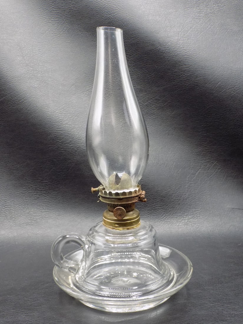 Unusual 1876 finger lamp with rare chimney and burner: Unusual 1876 finger lamp with rare chimney and burner. Marked as shown in photo. Base is one piece. In very good original as found condition. Great quality and detail. 10 inches tall to top of