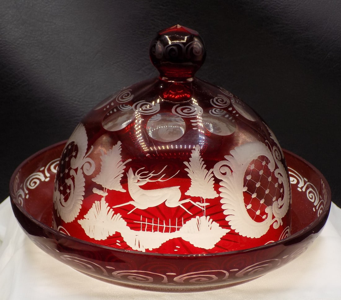 Vintage Bohemian red cut to clear art glass butter dish: Vintage Bohemian red cut to clear art glass butter dish. Has deer, house, tress and other decoration. Beautiful colors. In very good original as found condition. Great quality and detail. 5